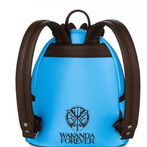 anti theft travel backpacks AAA.com l Travelon l The Voyages Anti-Theft Small Backpack with XL Water Bottle Pocket Height: 10.5 Orange Mud Trekking Pole Size:17.3‘’ and an RFID